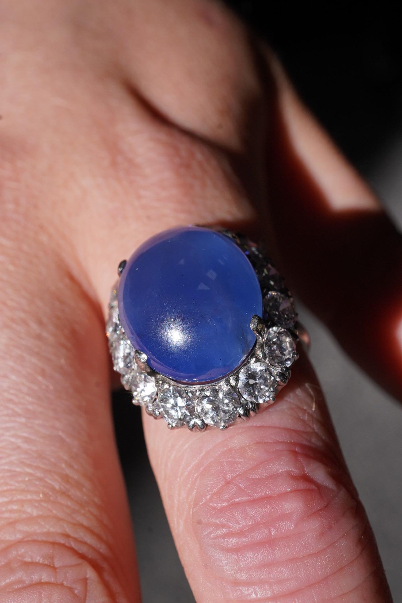 A sapphire and diamond ring, mid 20th century